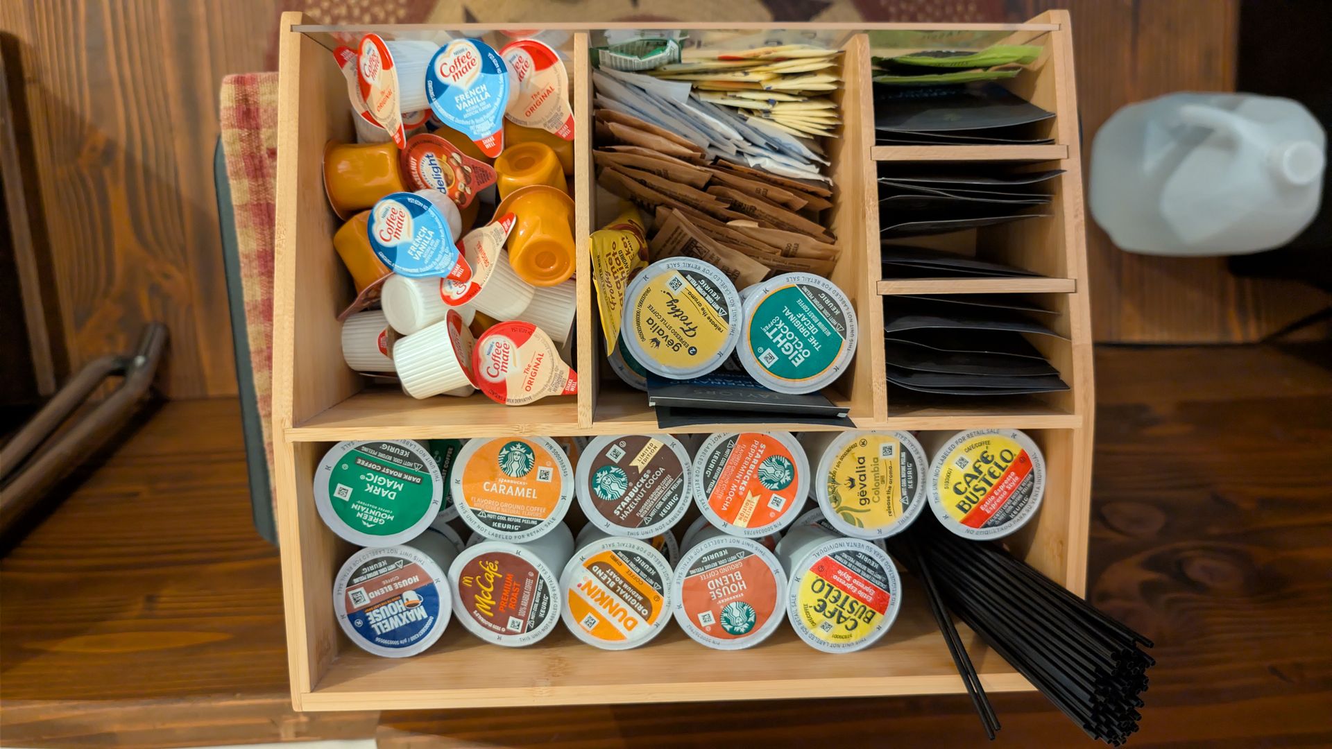 The wagon coffee station stocked with pods and creamers
